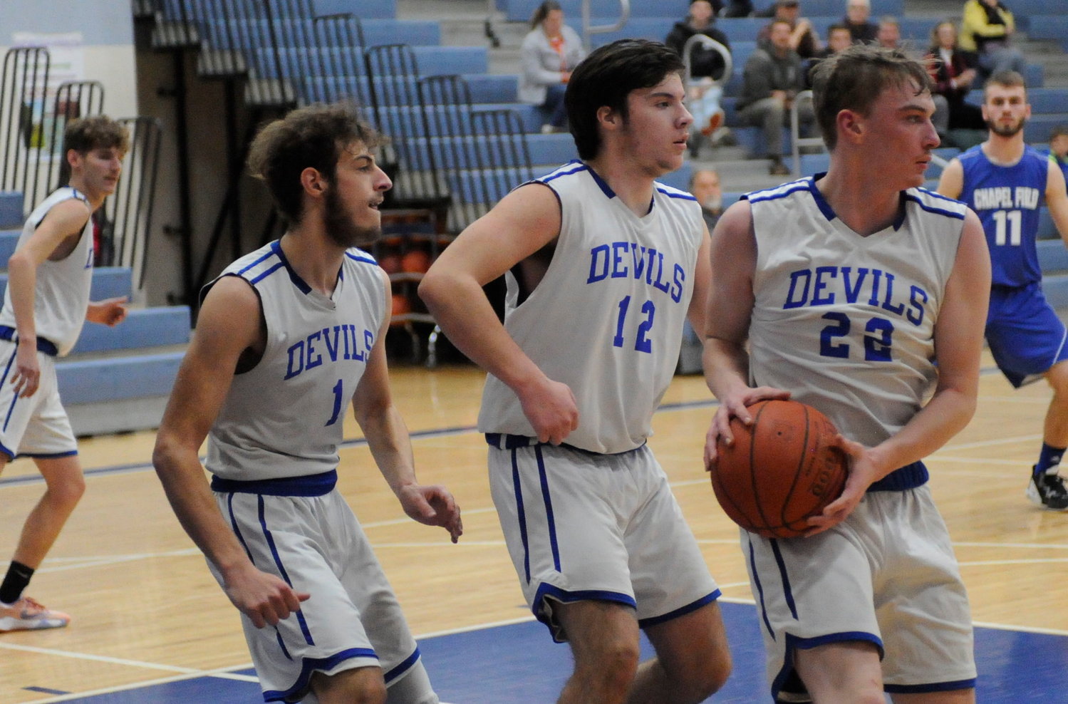 Triple Devils. Roscoe’s Anthony Teipelke scored 16 points for the Blue Devils. He is pictured with teammates Jayson Meola and Russ Hodge.
